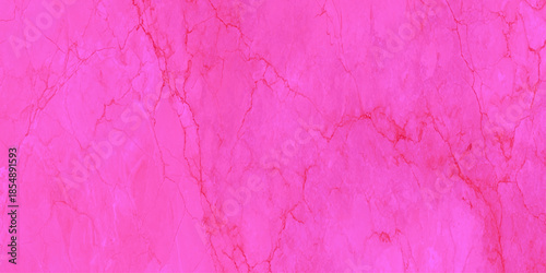 A vibrant and striking closeup of a pink marble texture featuring delicate veins and patterns throughout