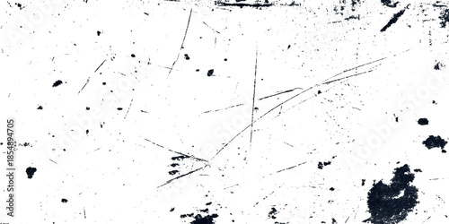 A stark white surface displaying various dark scratches smudges and imperfections creating a textured abstract background