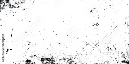 A heavily textured abstract black and white image featuring distressed edges and a faded gritty surface