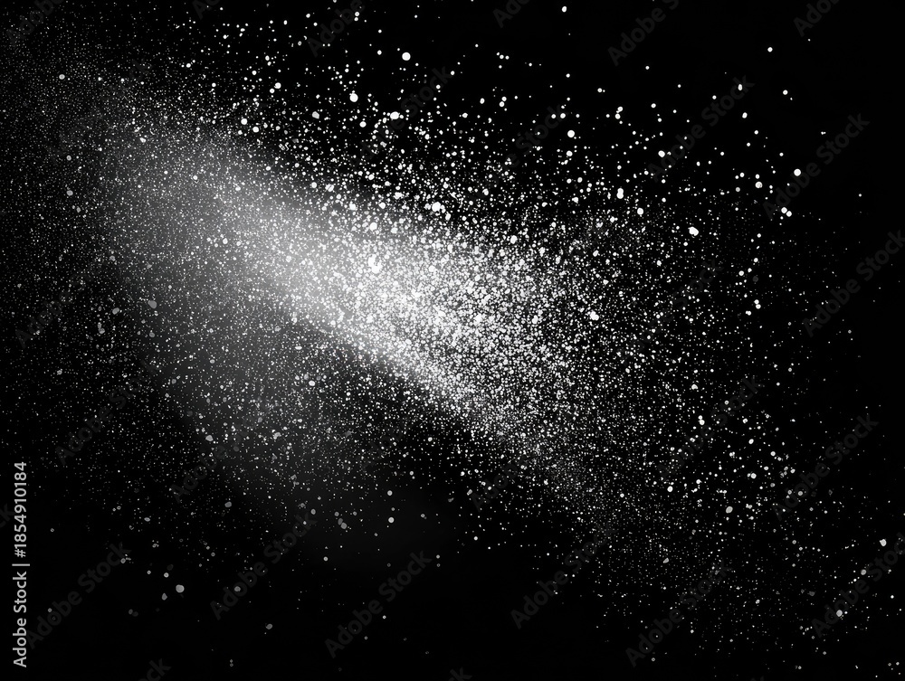 Fototapeta premium Black background with white particles creating a bright trail, abstract artistic design