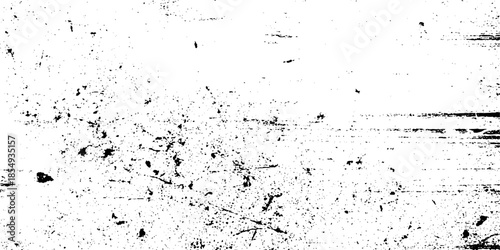 A detailed black and white grunge texture revealing an abstract pattern of scratches and dots.