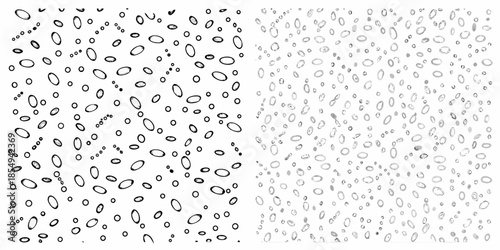 Abstract black and white pattern featuring scattered oval shapes and textures