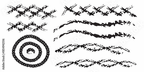 Collection of abstract black brush strokes and circular scribble patterns