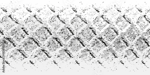 Detailed close up of a tire tread pattern against a light background