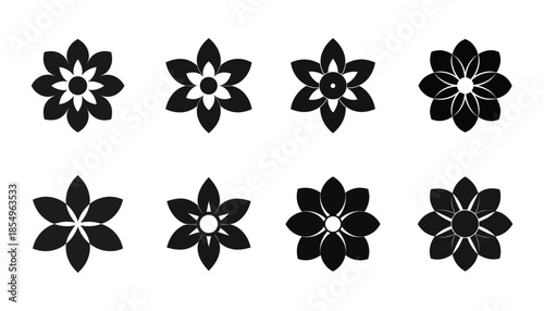 Collection of eight black floral silhouette designs with symmetrical petals