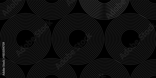 Grey abstract curved wavy lines on black background. Black background with line curve design. Blurred black silk fabric.