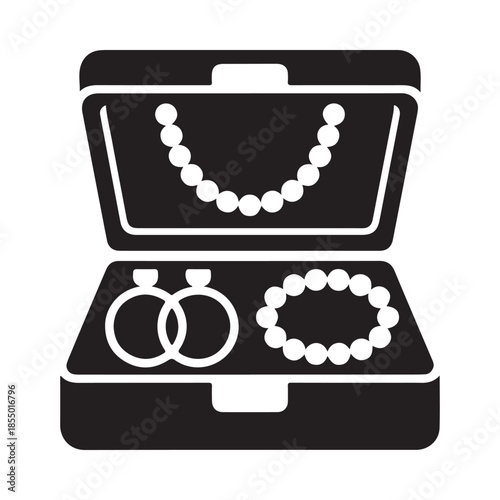 Open jewelry box displaying a necklace rings and a bracelet inside