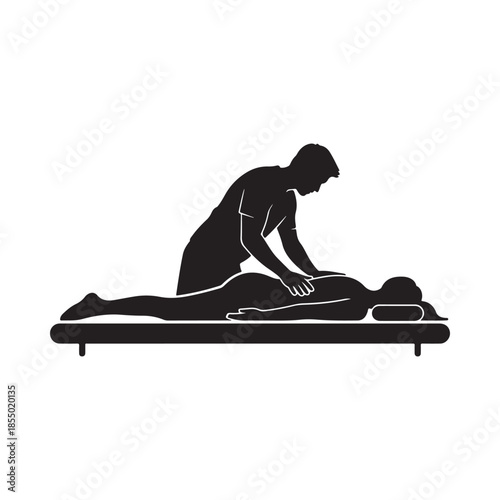 A silhouette of a massage therapist working on a client s back