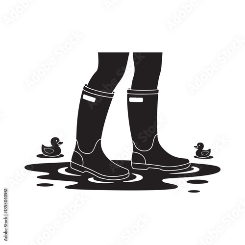 Black rubber boots standing in water with small duck silhouettes
