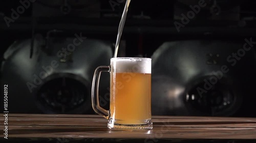 Craft Beer Pouring Into a Glass at High Speed With Foam Forming