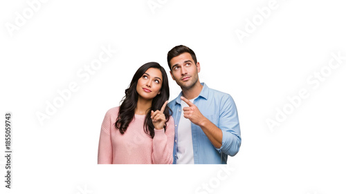 Couple pointing up thinking together