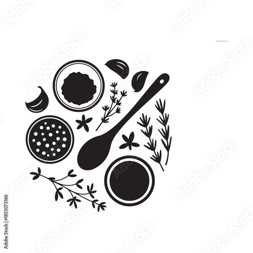 A flat lay arrangement of cooking ingredients and utensils in black and white
