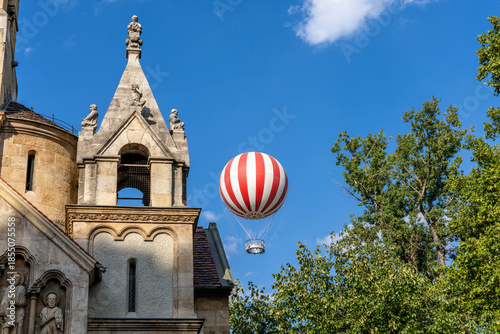 A Hot Air Balloon Tethered at a Park in Budapest Hungary Giving Scenic Views BalloonFly