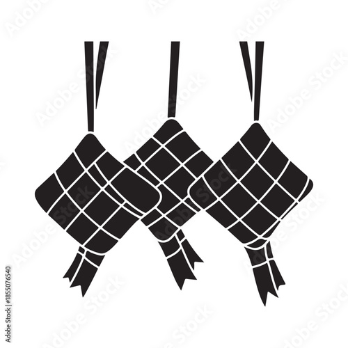 Three traditional ketupat rice cakes a popular southeast asian food item