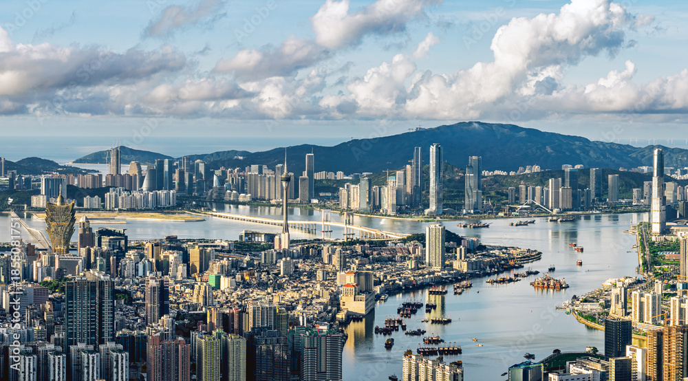 Naklejka premium Aerial view of the modern city skyline and sea scenery in Macau.