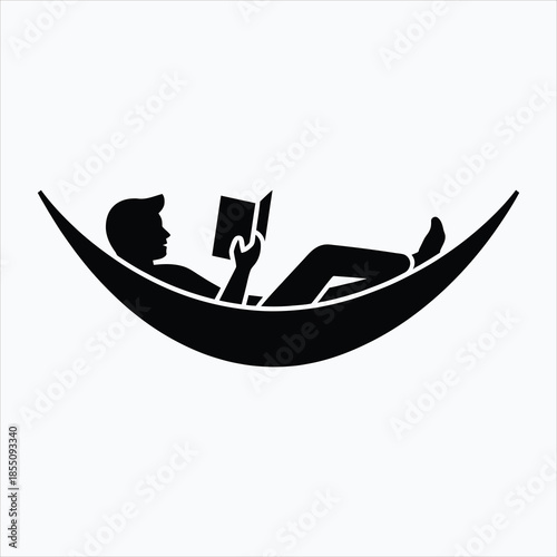 A relaxing person silhouette reading a book comfortably while lying in a suspended hammock