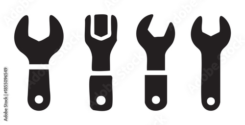 Four different black wrench tool icons representing maintenance, repair, and mechanical work, suitable for various industrial or DIY projects.