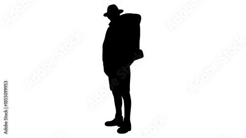 Silhouette of a person wearing a hat and carrying a backpack.