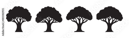 Four black tree silhouettes with lush canopies and strong trunks stand in a row, symbolizing nature, growth, and environmental conservation.