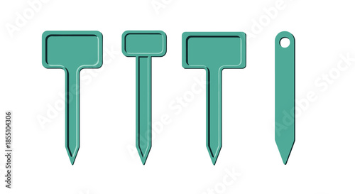 Set of green plastic garden labels and plant markers used for identifying different species in a nursery or home vegetable garden setting.
