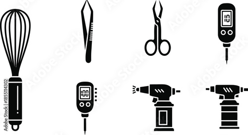 Professional chef equipment collection showing french whisk plating tweezers culinary thermometer and blowtorch high end cooking tools