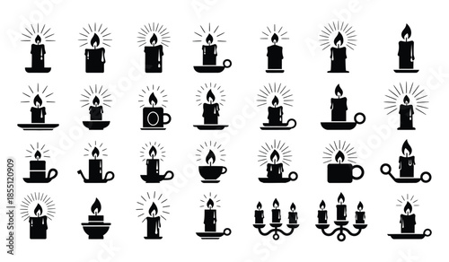 Set of black silhouette burning candles with glowing flames in various shapes and holders for celebration and ritual decoration