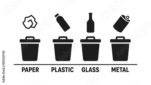 Four bins are labeled paper, plastic, glass, and metal for recycling.