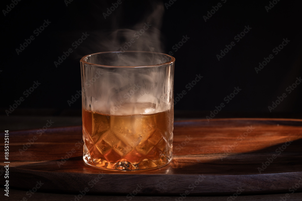 custom made wallpaper toronto digitalSmoked whiskey cocktail served on the rocks with dramatic lighting served on a wooden surface.