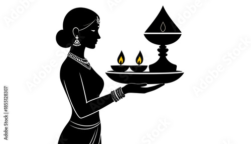 Elegant silhouette of a woman holding a traditional Indian oil lamp for Diwali.