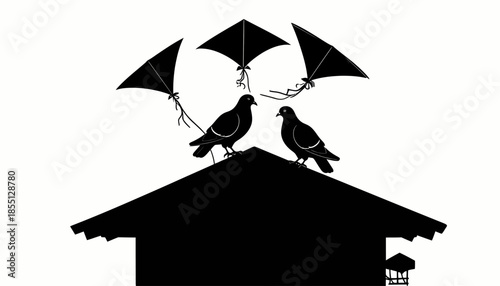 Silhouette of two pigeons on a roof with kites flying above them in black and white.
