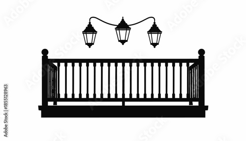 Silhouette of a balcony with railing and hanging lanterns.