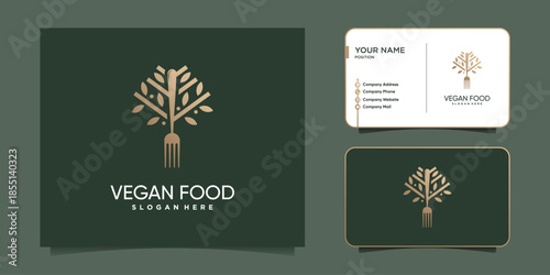 Vegan food logo with tree and fork concept Premium Vector