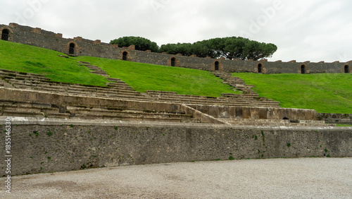 beautiful landscape from Pompeii ancient archeological excavation to Vesuvius volcano and amazing cloudy cky on background