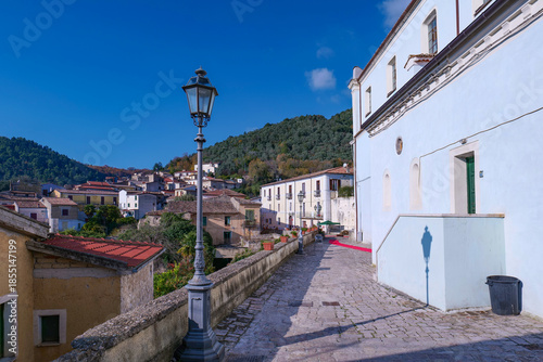 A narrow street among the old houses of Sant'Angelo d'Alife, a town in the province of Caserta, Italy.