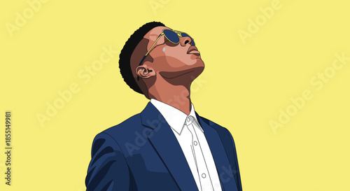 Close-up portrait of a man wearing a blue suit and gold sunglasses gazing upwards towards the light on a yellow background.