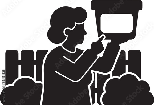 Woman pointing at plant pot in garden fence background gardening hobby agriculture