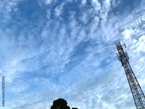 Cloudy Blue Sky Above Urban Area tower