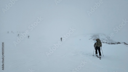people walking in the snow