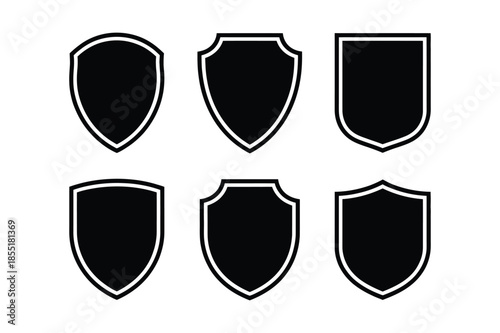 Blank shield silhouette icons for security and badge emblems