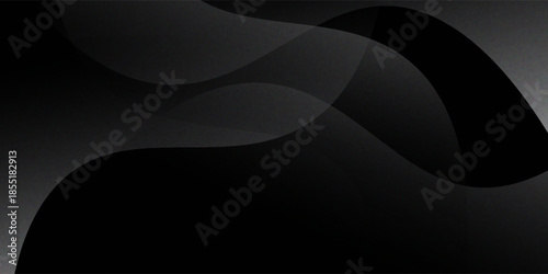 Sandblasted or brushed titanium or steel metal surface, the light reflection of the curved lines creates a smooth gradation on the dark black metallic background