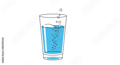 Clear glass filled with blue sparkling water and rising bubbles isolated on a plain white background for refreshment concepts.