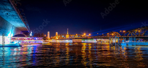 The Memorial bridge, or Phra Phuttayotfa bridge, viewed from the Chao Phraya riverside, Bangkok, Thailand