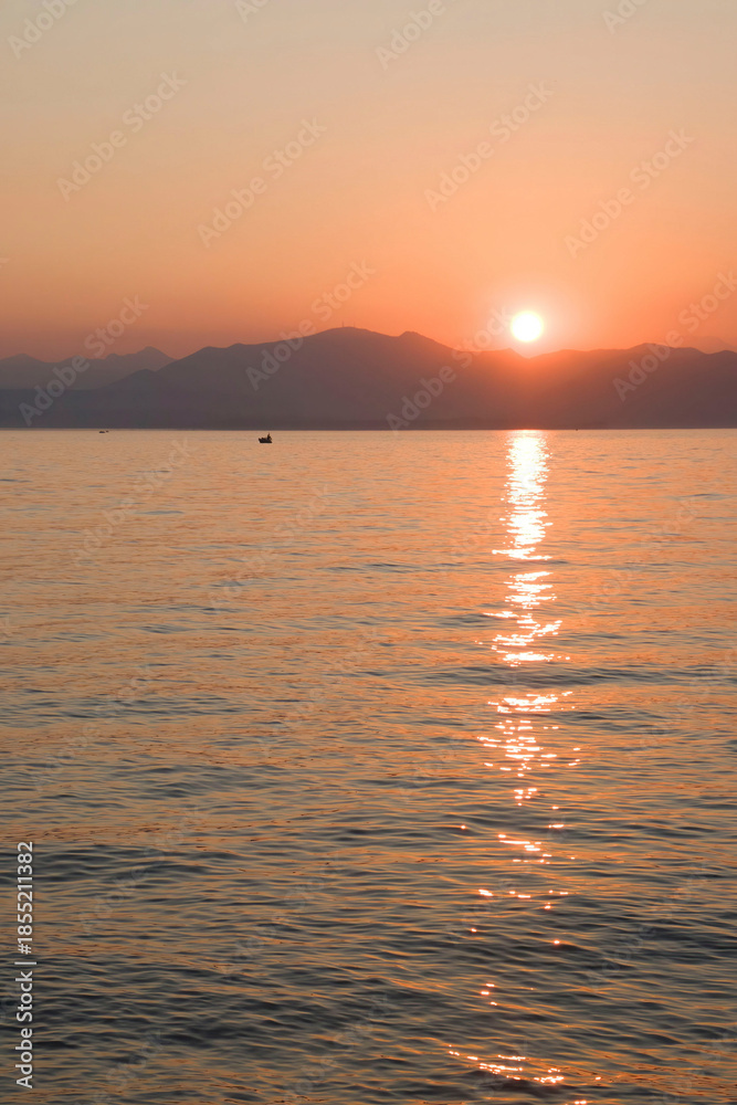 Obraz premium Sunset over Lake Garda