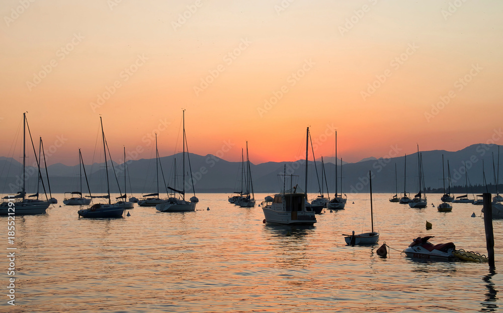 Fototapeta premium Boats on the water at Italian lake