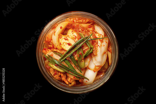 Close-up view of traditional Korean kimchi showing detailed texture of fermented cabbage with seasonings, presented as part of Korean cuisine and healthy eating lifestyle.