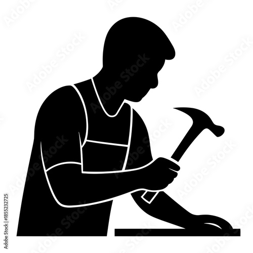 Vector silhouettes of silhouette of a carpenter or handyman hammering a nail