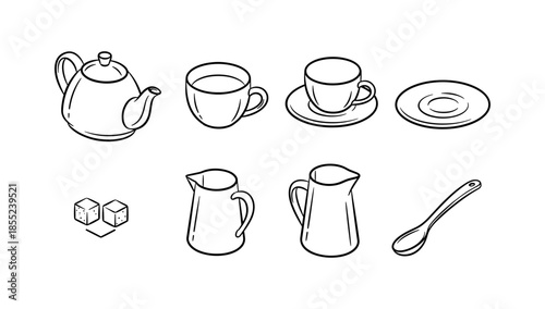 Simple black and white tea set with teapot, cups, sugar cubes, and spoon
