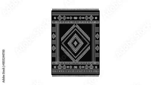 Black and white geometric rug with a diamond pattern and tassel details