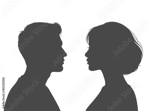 Silhouettes of a man and a woman facing each other in profile