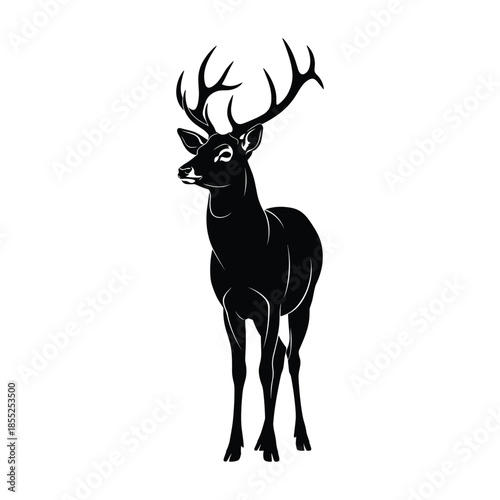 A majestic black deer stands proudly with large antlers